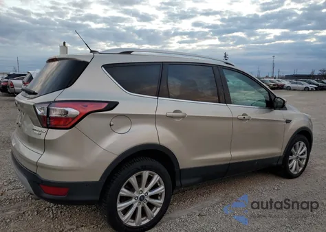 2017 Ford Escape Titanium z USA, uszkodzony, nr VIN 1FMCU9JD6HUC17074